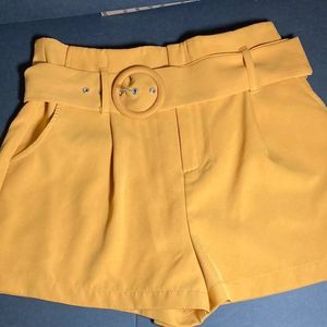 Ladies dress shorts in goldenrod color, size small from forever 21